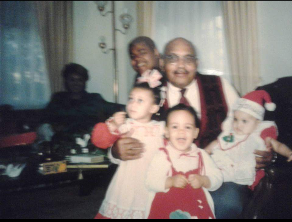 

Pop holding Candace on the left, Jessica on the right and Andrea in the middle.